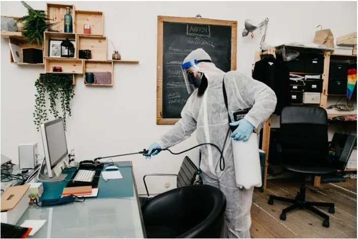 Technician on a seasonal home protection visit
